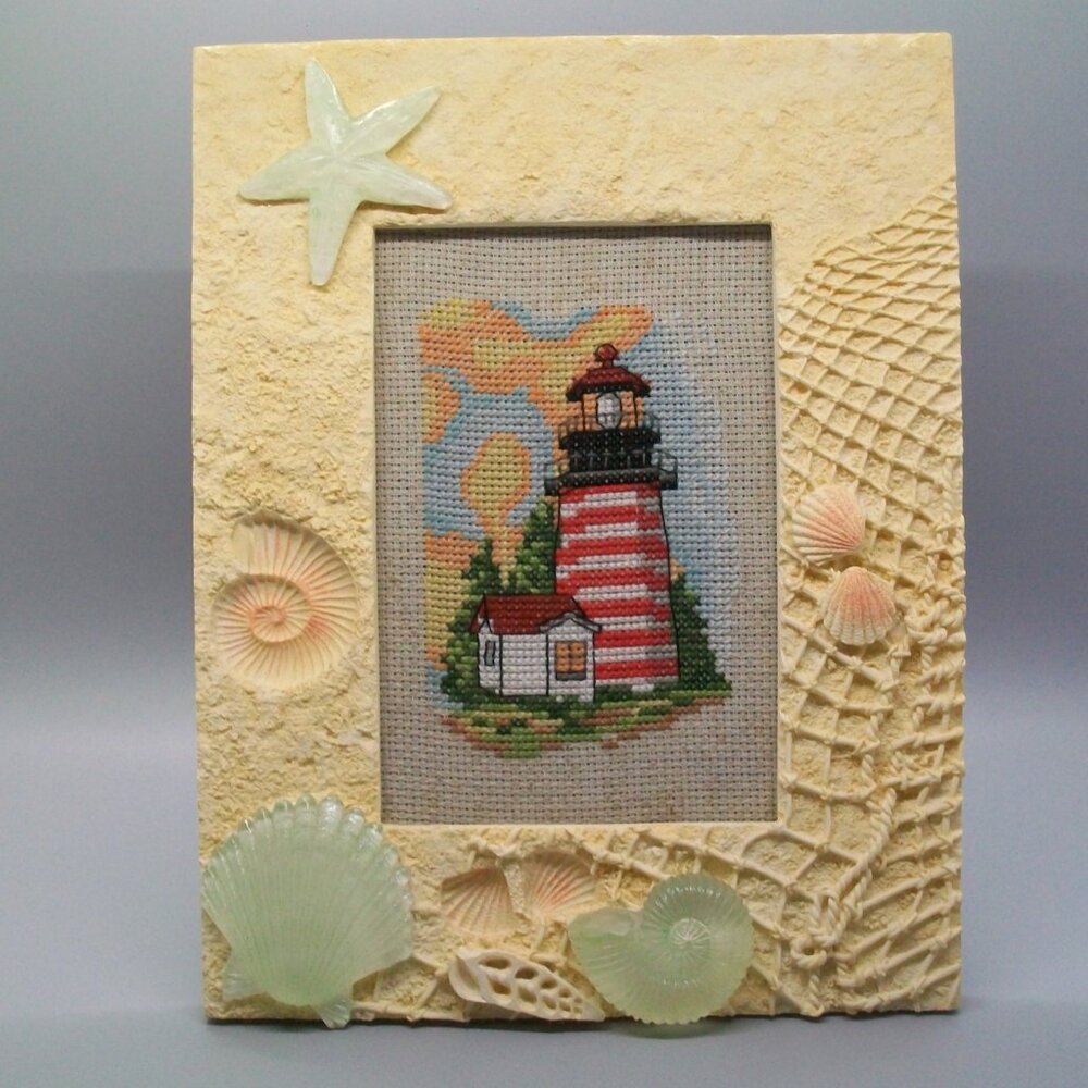 Handmade Cross Stitch Red White Stripe Lighthouse Scene in Seashell Frame